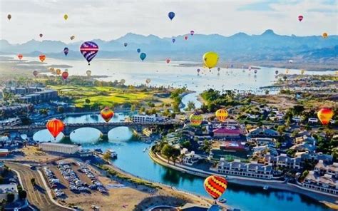 Balloon festival lake havasu arizona - Jan 24, 2024 · Details. Generally, about 30,000-50,000 attendees enjoy the balloons floating over the London Bridge, around the Bridgewater Channel, and Lake Havasu City every year. You can bring a blanket or a chair and have an unforgettable time in the expansive balloon field and vendor area. The general admission is $20 per person; the fan zone costs $70 ... 